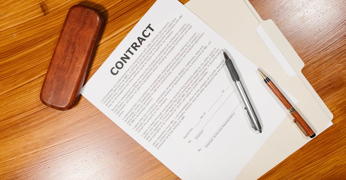 Legal contract document with a pen